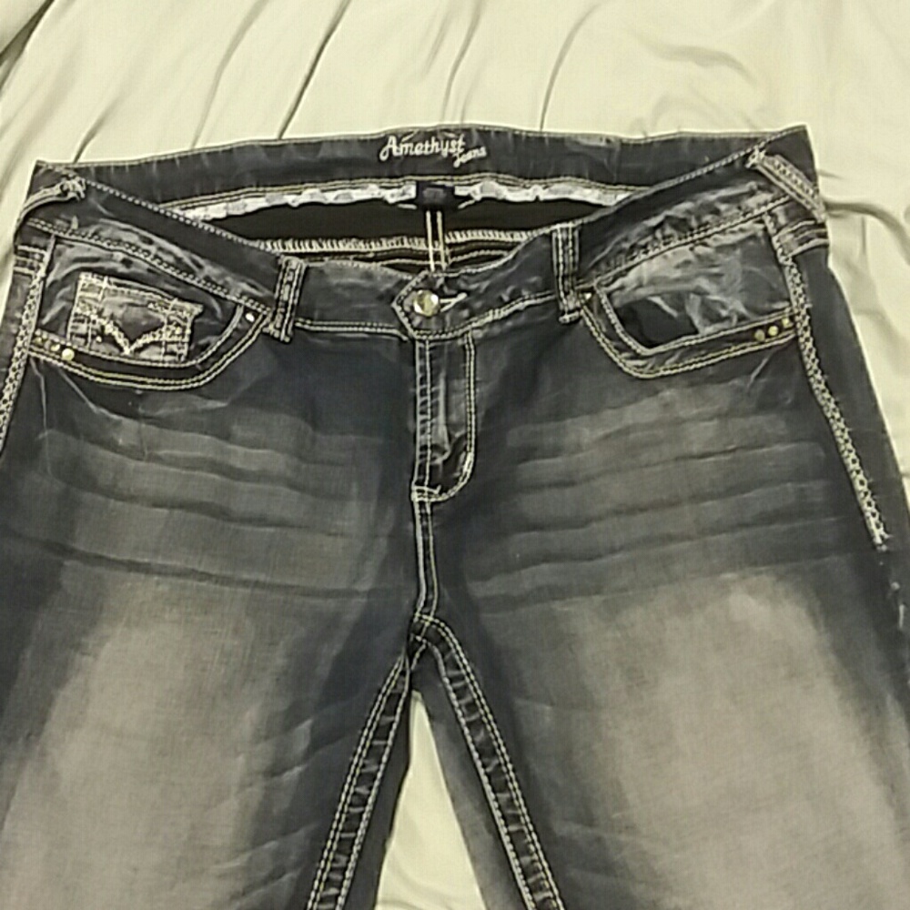 Amethyst Dark and faded blue jeans